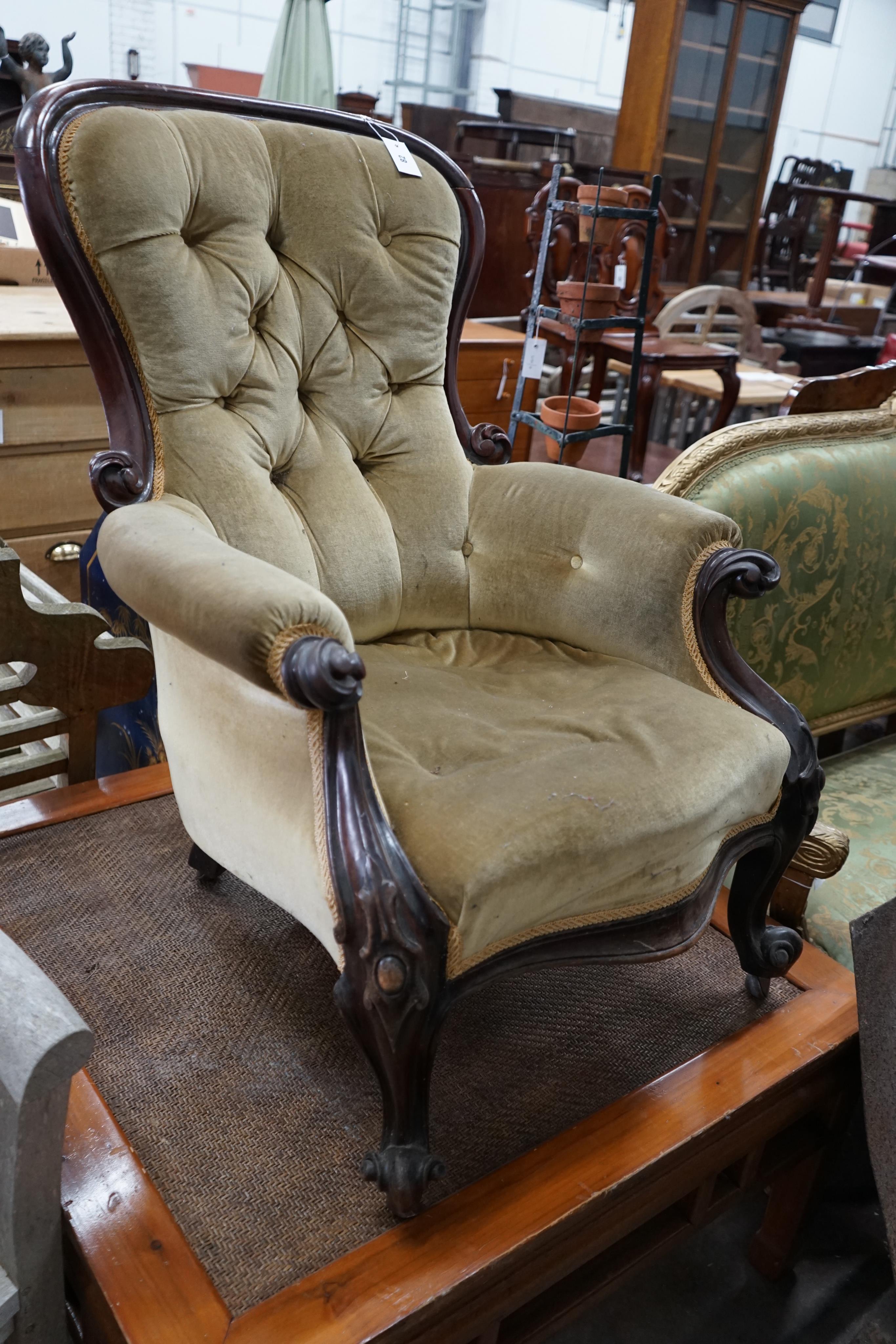 A Victorian mahogany upholstered spoonback armchair, width 70cm depth 70cm height 96cm